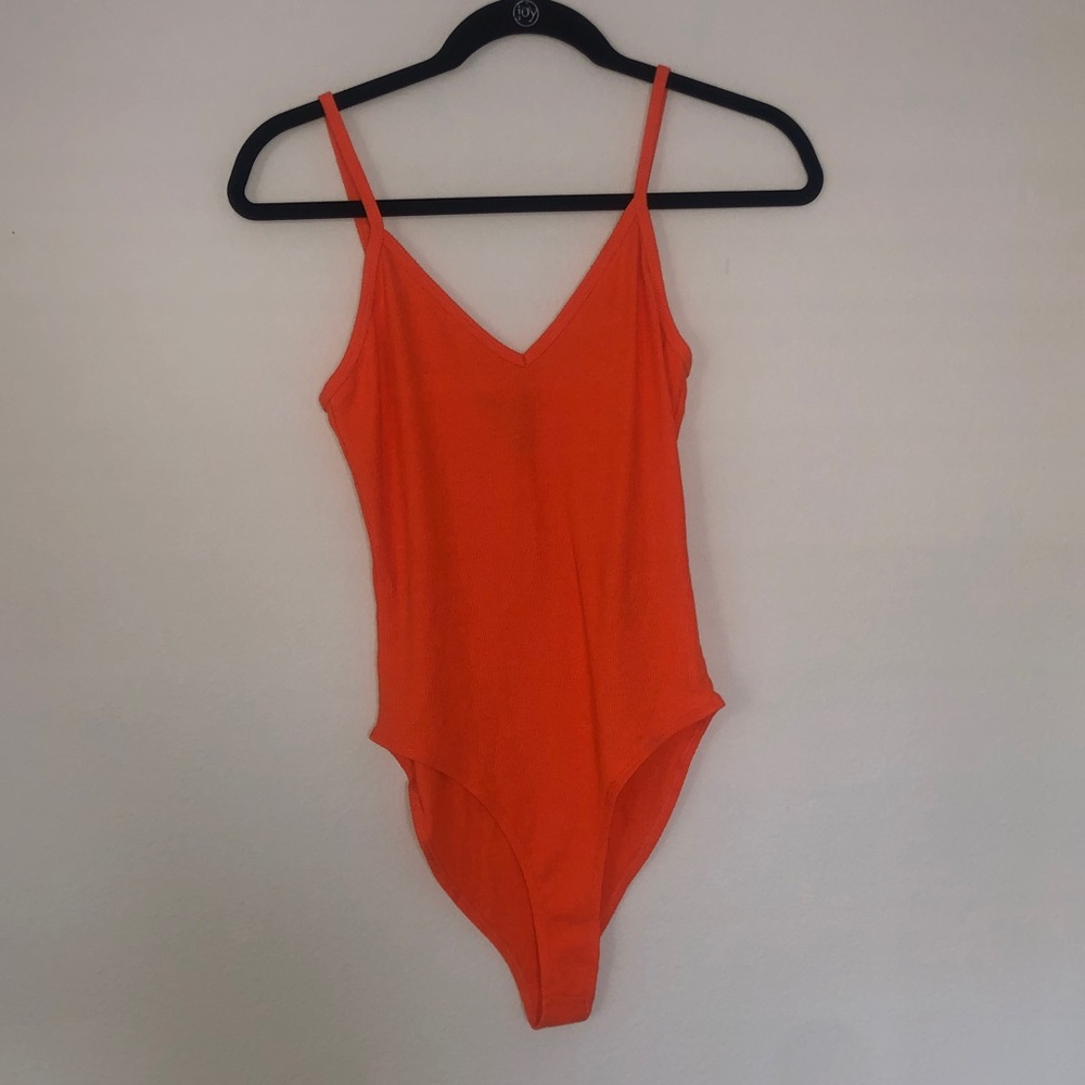 Orange bodysuit